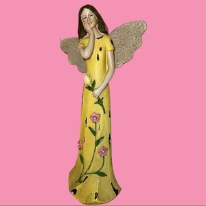 Pretty angel! She’s a beauty with her yellow gown and yellow rose!